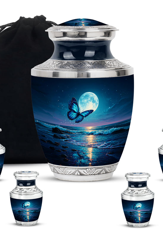 Cobalt Blue Butterfly Cremation Urn lifestyle display on memorial shelf - stylized abstract butterfly pattern with bold lines - memorial set with one large and four small urns