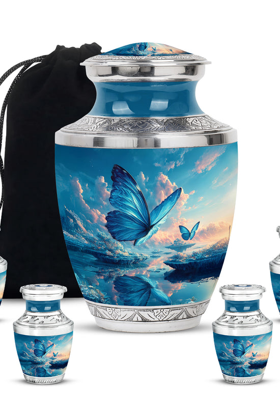 Vivid Blue Butterfly Cremation Urn lifestyle display on memorial shelf - stylized abstract butterfly pattern with bold lines - memorial set with one large and four small urns