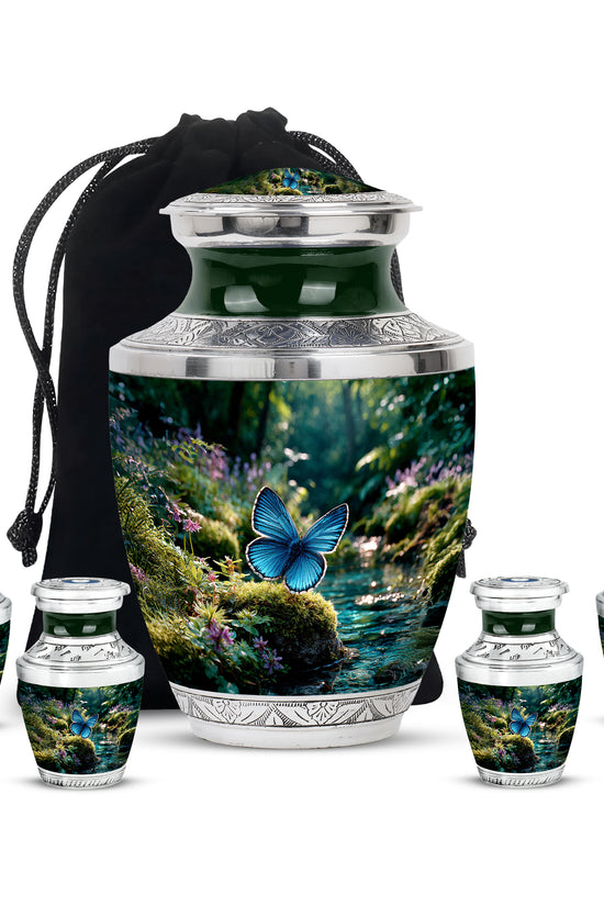 Moss Green Butterfly Cremation Urn lifestyle display on memorial shelf - contemporary butterfly design with modern artistic flair - memorial set with one large and four small urns