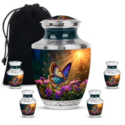Warm Gold Butterfly Cremation Urn lifestyle display on memorial shelf - stylized abstract butterfly pattern with bold lines - memorial set with one large and four small urns