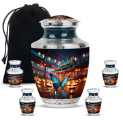 Steel Blue Butterfly Cremation Urn lifestyle display on memorial shelf - stylized abstract butterfly pattern with bold lines - memorial set with one large and four small urns