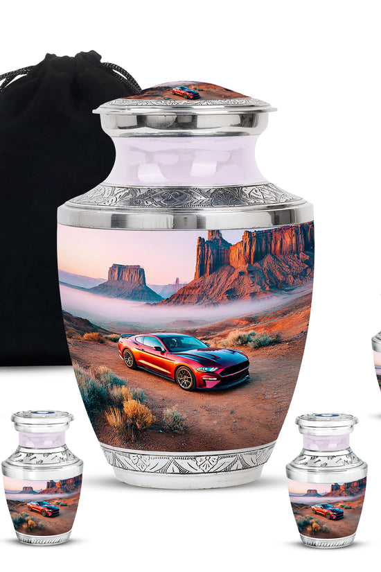 Polished Silver Car Cremation Urn lifestyle display on memorial shelf - stylized abstract car pattern with bold lines - memorial set with one large and four small urns