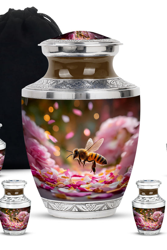 Warm Gold Bee Cremation Urn lifestyle display on memorial shelf - artistic bee interpretation with creative detail - memorial set with one large and four small urns