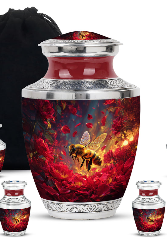 Salmon Pink Bee Cremation Urn lifestyle display on memorial shelf - stylized abstract bee pattern with bold lines - memorial set with one large and four small urns