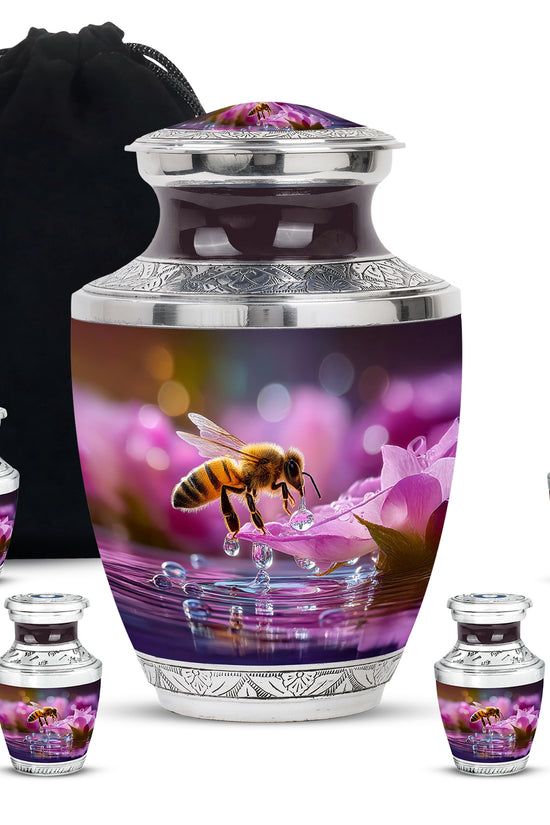 Deep Red Bee Cremation Urn lifestyle display on memorial shelf - contemporary bee design with modern artistic flair - memorial set with one large and four small urns
