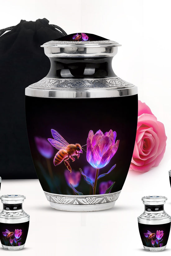 Rich Black Bee Cremation Urn lifestyle display on memorial shelf - modern art-inspired bee motif on sleek aluminum - memorial set with one large and four small urns