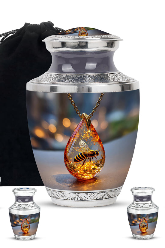 Rich Black Bee Cremation Urn lifestyle display on memorial shelf - modern art-inspired bee motif on sleek aluminum - memorial set with one large and four small urns