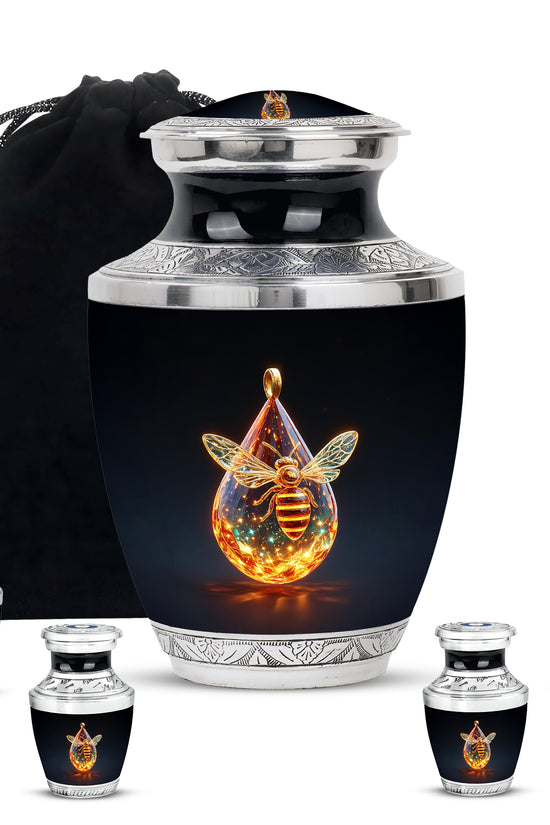 Ebony Bee Cremation Urn lifestyle display on memorial shelf - contemporary bee design with modern artistic flair - memorial set with one large and four small urns