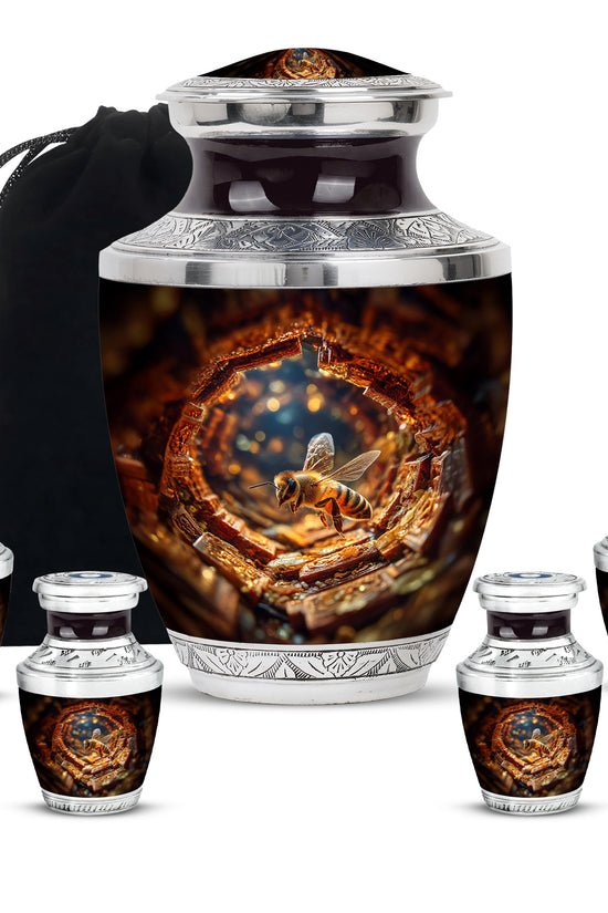 Wine Red Bee Cremation Urn lifestyle display on memorial shelf - contemporary bee design with modern artistic flair - memorial set with one large and four small urns