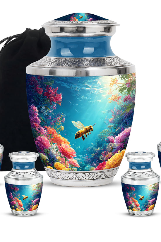 Cornflower Blue Bee Cremation Urn lifestyle display on memorial shelf - stylized abstract bee pattern with bold lines - memorial set with one large and four small urns