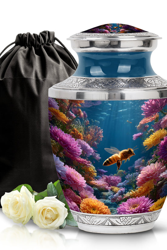 Indigo Bee Cremation Urn side profile showing urn shape - modern art-inspired bee motif on sleek aluminum - full-size 10 inch 200 cubic inch adult cremation urn