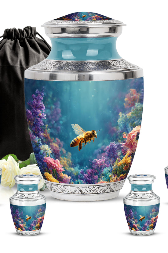 Deep Teal Bee Cremation Urn lifestyle display on memorial shelf - stylized abstract bee pattern with bold lines - memorial set with one large and four small urns