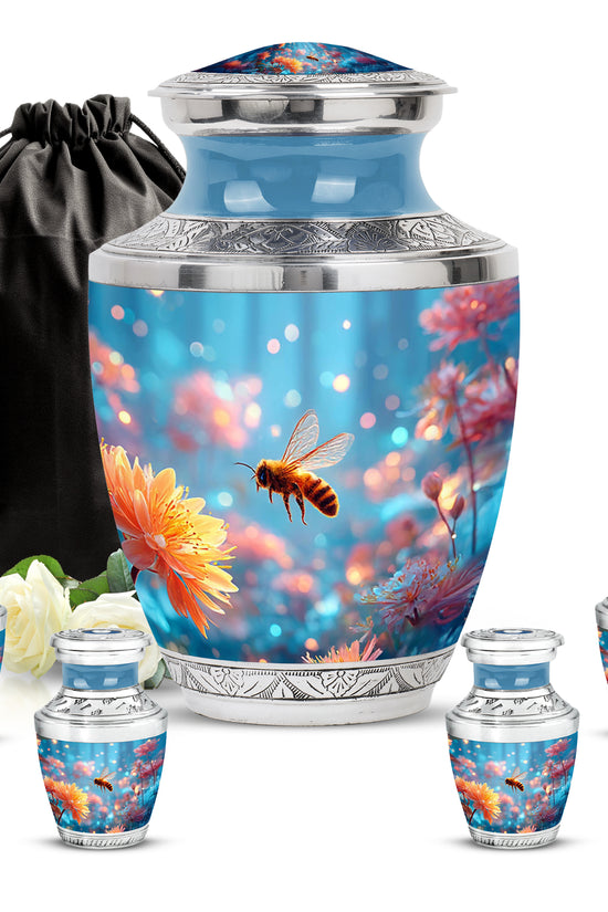 Soft Blue Bee Cremation Urn lifestyle display on memorial shelf - stylized abstract bee pattern with bold lines - memorial set with one large and four small urns