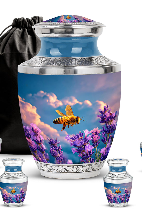 Powder Blue Bee Cremation Urn lifestyle display on memorial shelf - contemporary bee design with modern artistic flair - memorial set with one large and four small urns