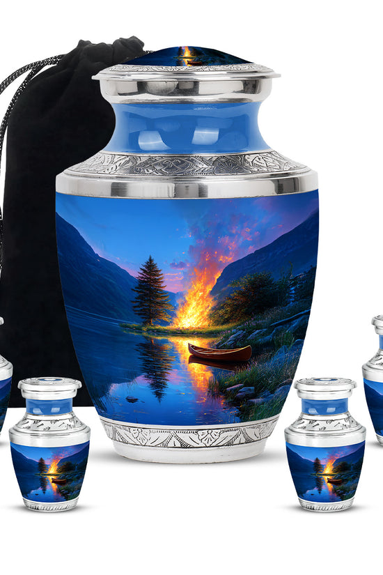 Icy Blue Campfire Cremation Urn lifestyle display on memorial shelf - modern art-inspired campfire motif on sleek aluminum - memorial set with one large and four small urns