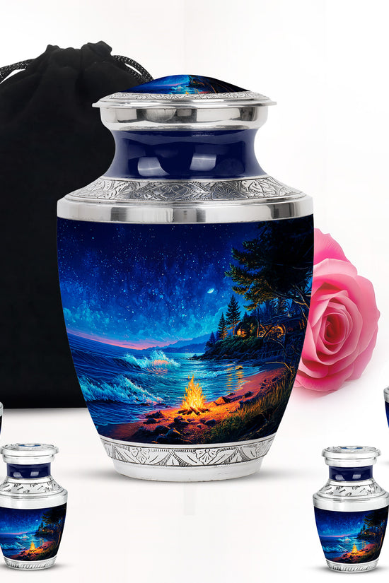 Pastel Blue Campfire Cremation Urn lifestyle display on memorial shelf - modern art-inspired campfire motif on sleek aluminum - memorial set with one large and four small urns