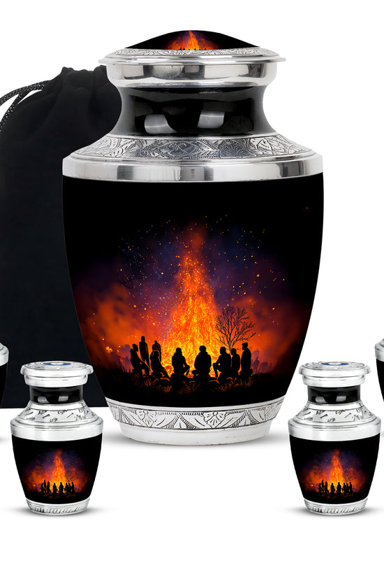 Deep Black Campfire Cremation Urn lifestyle display on memorial shelf - modern art-inspired campfire motif on sleek aluminum - memorial set with one large and four small urns