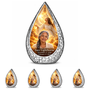 10 inch large Urn with 4 Keepsake 3 Inch Urns Straight Drop memorial urn, guardian angel in amber cloudlight, Inez Lightborne portrait and full memorial dates, white background.