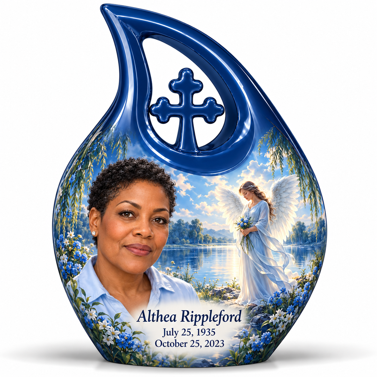 10 inch large Urn, Cross Drop angel beside quiet blue water memorial urn and Althea Rippleford photo and dates.