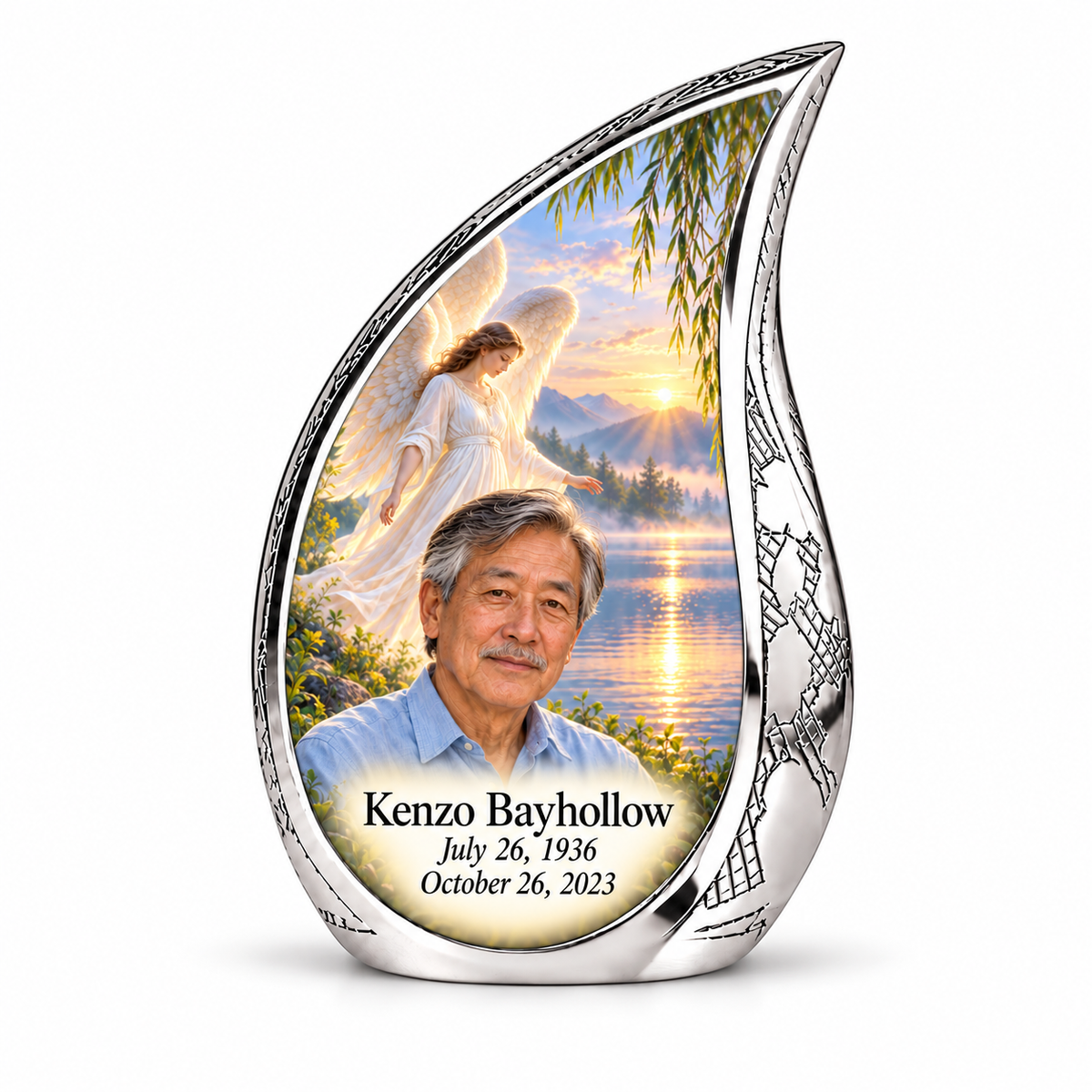 1 Keepsake 3 inch Urn, Curved Drop angel beside quiet blue water memorial urn and Kenzo Bayhollow photo and dates.