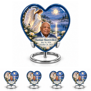 10 inch large Urn with 4 Keepsake 3 Inch Urns, Heart angel beside quiet blue water memorial urn and Bastian Shorewillow photo and dates.