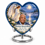 10 inch large Urn, Heart angel beside quiet blue water memorial urn and Bastian Shorewillow photo and dates.