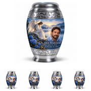 10 inch large Urn with 4 Keepsake 3 Inch Urns, Monar angel beside quiet blue water memorial urn and Oren Brookstead photo and dates.