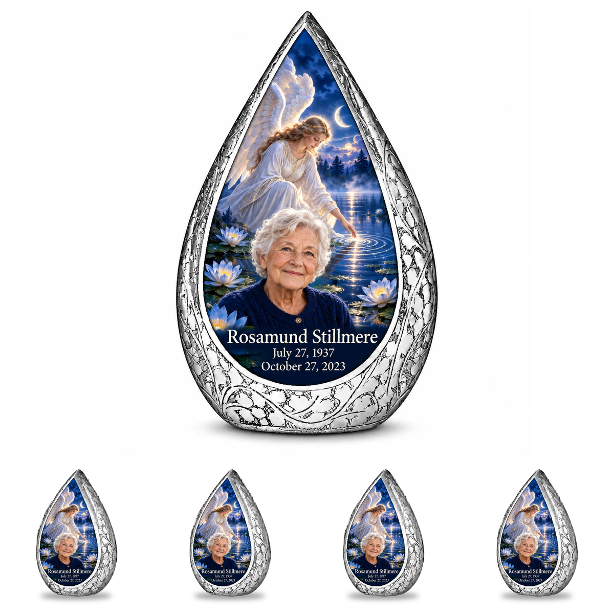 10 inch large Urn with 4 Keepsake 3 Inch Urns Straight Drop memorial urn, angel beside quiet blue water, Rosamund Stillmere portrait and full memorial dates, white background.