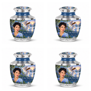 4 Keepsake 3 inch Urns, Tasty angel beside quiet blue water memorial urn and Celia Watersong photo and dates.