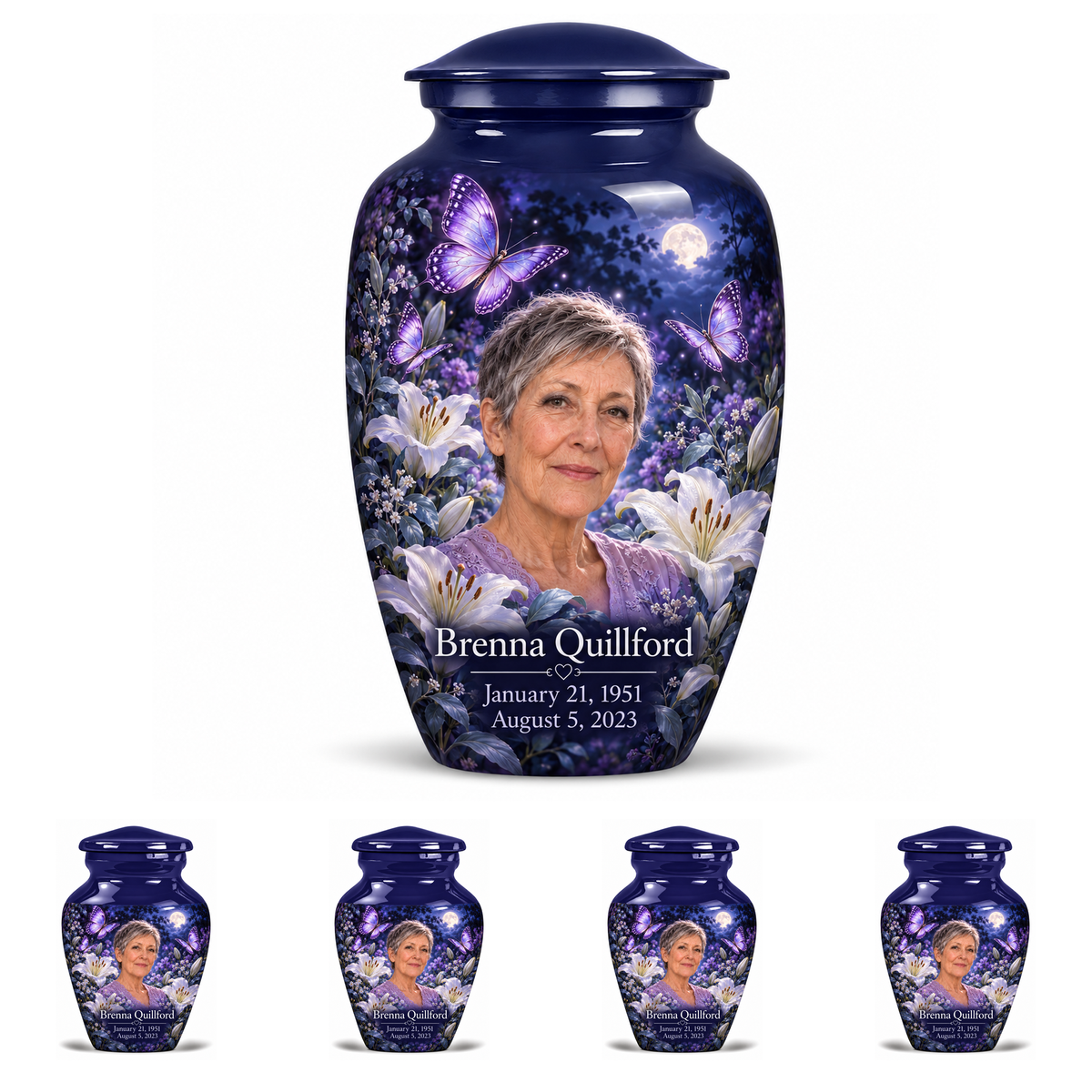 10 inch large Urn with 4 Keepsake 3 Inch Urns, Classic urn with purple butterflies and moonlit white lilies, Brenna Quillford portrait, January 21, 1951 to August 5, 2023.