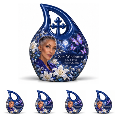 10 inch large Urn with 4 Keepsake 3 Inch Urns, Cross Drop urn with purple butterflies and moonlit white lilies, Zora Windhaven portrait, July 9, 1958 to October 26, 2022.