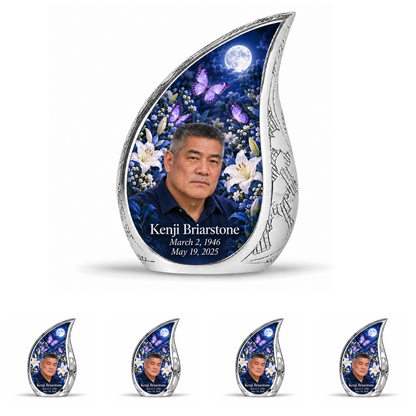 10 inch large Urn with 4 Keepsake 3 Inch Urns, Curved Drop urn with purple butterflies and moonlit white lilies, Kenji Briarstone portrait, March 2, 1946 to May 19, 2025.