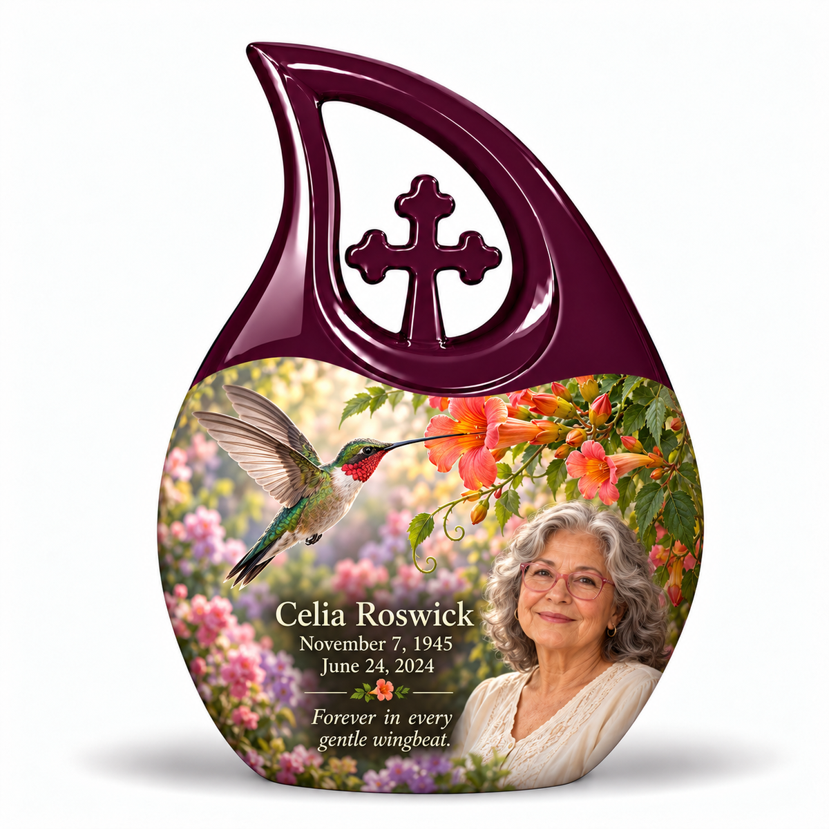 Hummingbird 01 Cross Drop, 10 inch large Urn: glossy mulberry-plum loop above a ruby-throated hummingbird, coral trumpet flowers and rose-lavender garden; fictional Celia Roswick portrait, name and full dates.