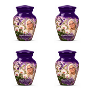 Four identical 3-inch keepsakes in the Classic urn with violet hummingbird above white orchids, fictional Elspeth Waverly portrait with silver braid and violet glasses, name and full memorial dates on white.