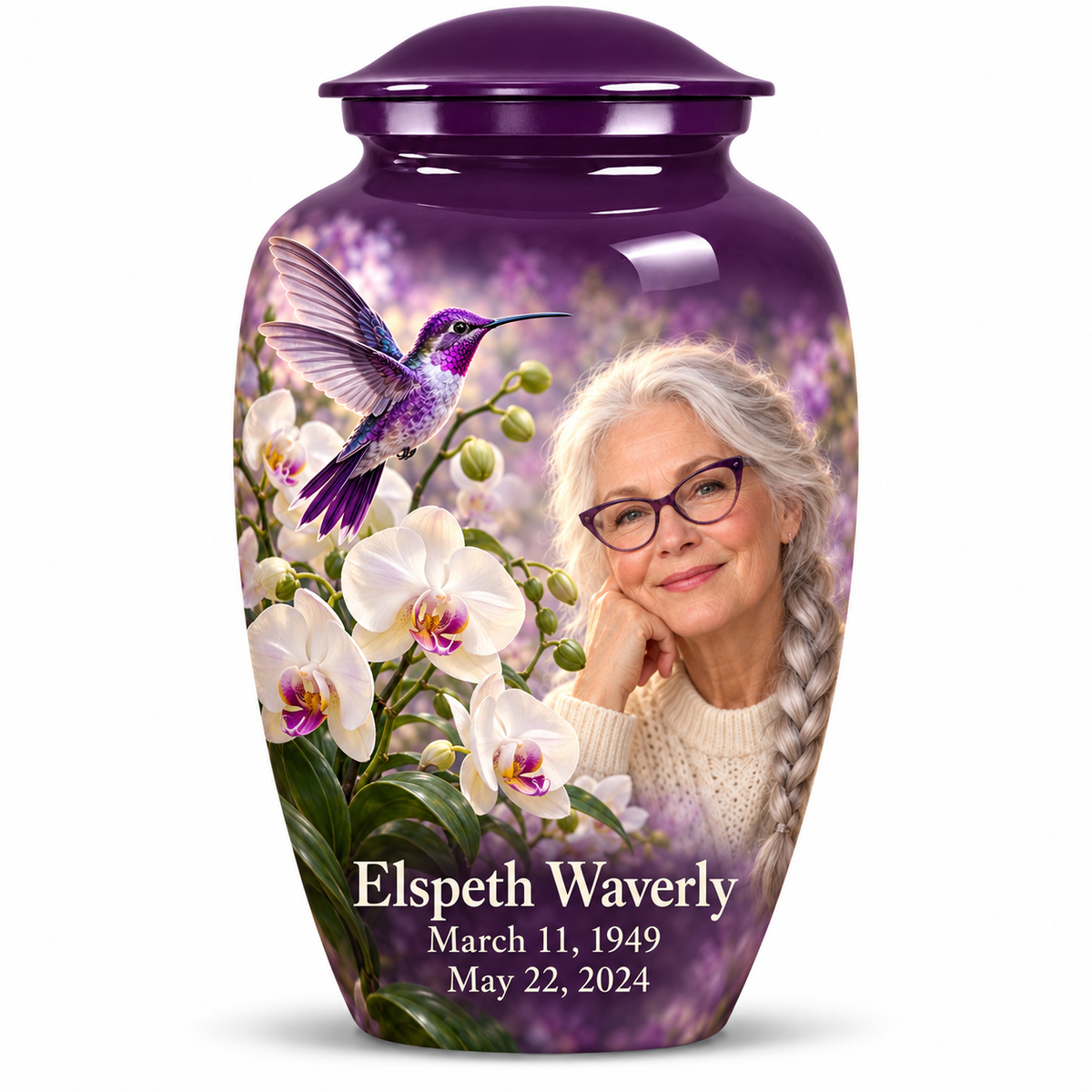 One 10-inch large Classic urn with violet hummingbird above white orchids, fictional Elspeth Waverly portrait with silver braid and violet glasses, name and full memorial dates on white.