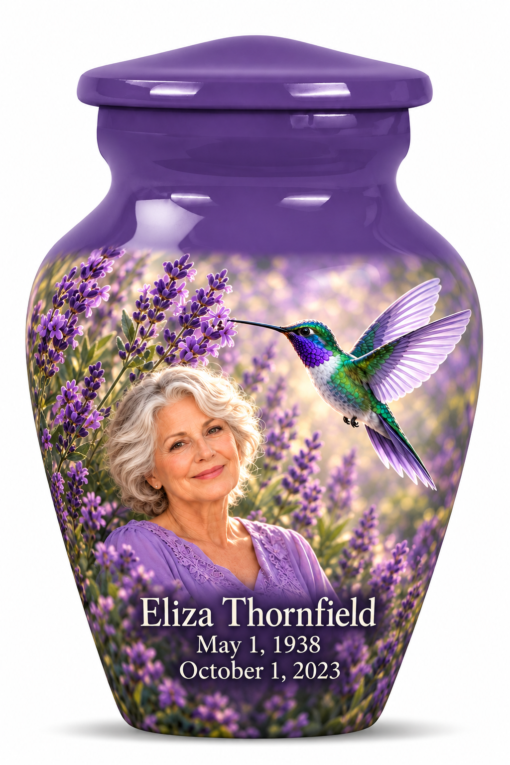 One squat 3-inch Classic keepsake with plain shoulder with lavender caps, green and violet hummingbirds at lavender flowers and fictional Eliza Thornfield portrait, May 1, 1938 to October 1, 2023.