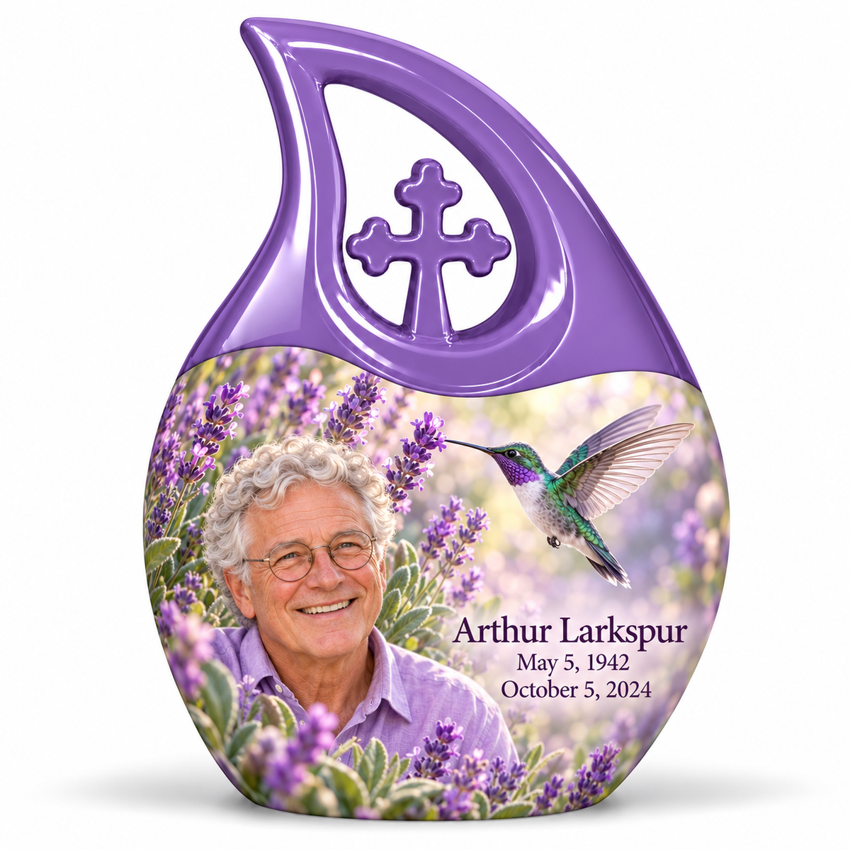 Large lavender Cross Drop urn with sculpted cross, emerald-violet hummingbird among lavender and Arthur Larkspur portrait, name and full dates.