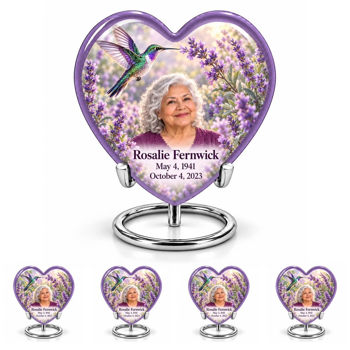 Large lavender Heart urn above four matching keepsakes, all on complete silver ring stands, with lavender garden hummingbird and Rosalie Fernwick portraits.