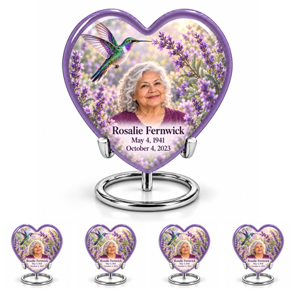 Large lavender Heart urn above four matching keepsakes, all on complete silver ring stands, with lavender garden hummingbird and Rosalie Fernwick portraits.