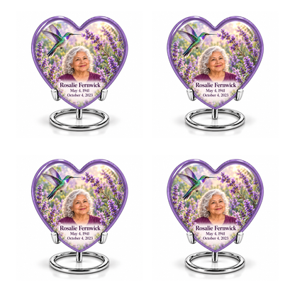 Four identical lavender Heart keepsakes with silver ring stands, emerald-violet hummingbird artwork and Rosalie Fernwick portrait and personalization.
