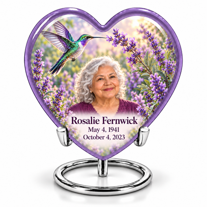 Single lavender Heart keepsake with complete silver ring stand, hummingbird among lavender and Rosalie Fernwick portrait and full dates.