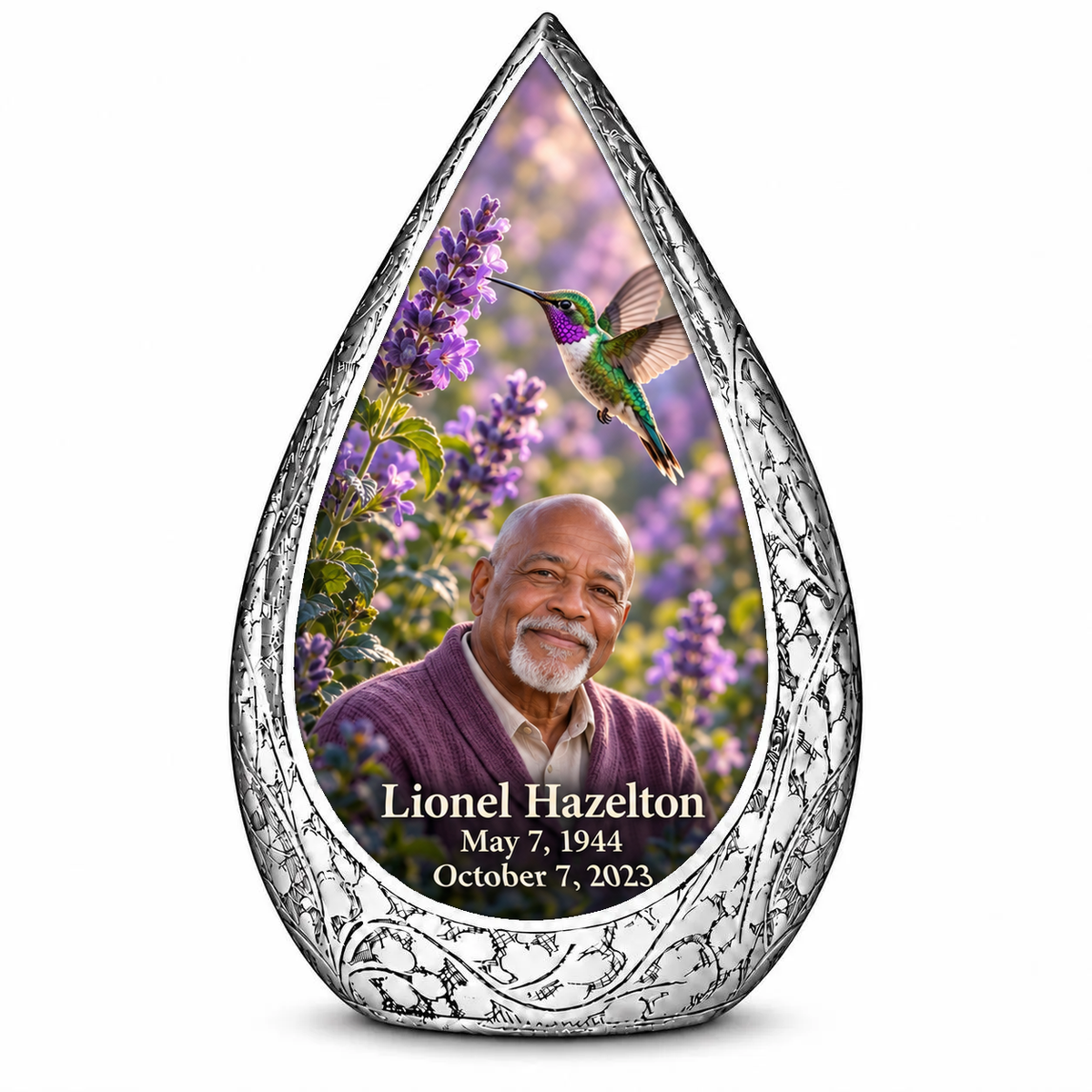 Large Straight Drop memorial urn, emerald and violet hummingbird at lavender flowers, Lionel Hazelton portrait and full memorial dates, white background.
