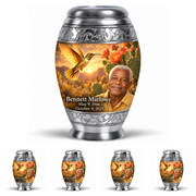 One large Monar urn above four matching keepsakes with golden hummingbirds, coral cactus flowers and Bennett Marlowe memorial portraits.