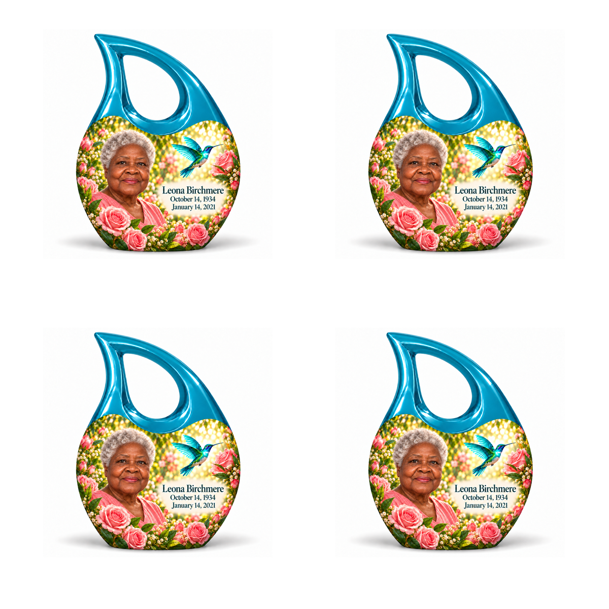 4 Keepsake 3 inch Urns; Glossy turquoise Cross Drop with vivid turquoise/cyan hummingbird wings and soft pink roses. Corrected Leona Birchmere has a broad hexagonal face, strong wide jaw, broad flat nose, low brows, round widely spaced eyes, full wide lips, short silver natural curls and pink blouse. Dark teal name and October 14, 1934 / January 14, 2021 dates are accurate.