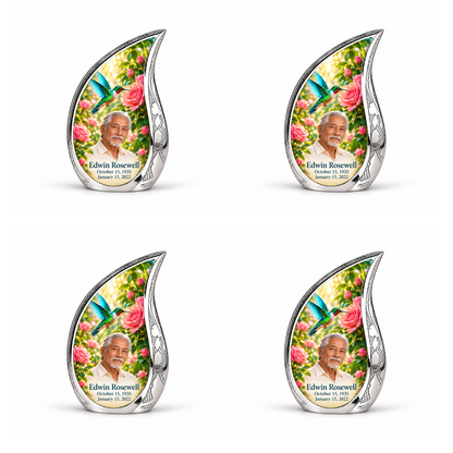 4 Keepsake 3 inch Urns; Engraved silver Curved Drop with vivid turquoise and icy cyan hummingbird wings above soft pink roses and green leaves. Edwin Rosewell has a narrow angular East Asian face, swept-back silver hair, small white beard and cream shirt. Dark teal name and October 15, 1935 / January 15, 2022 dates are accurate.