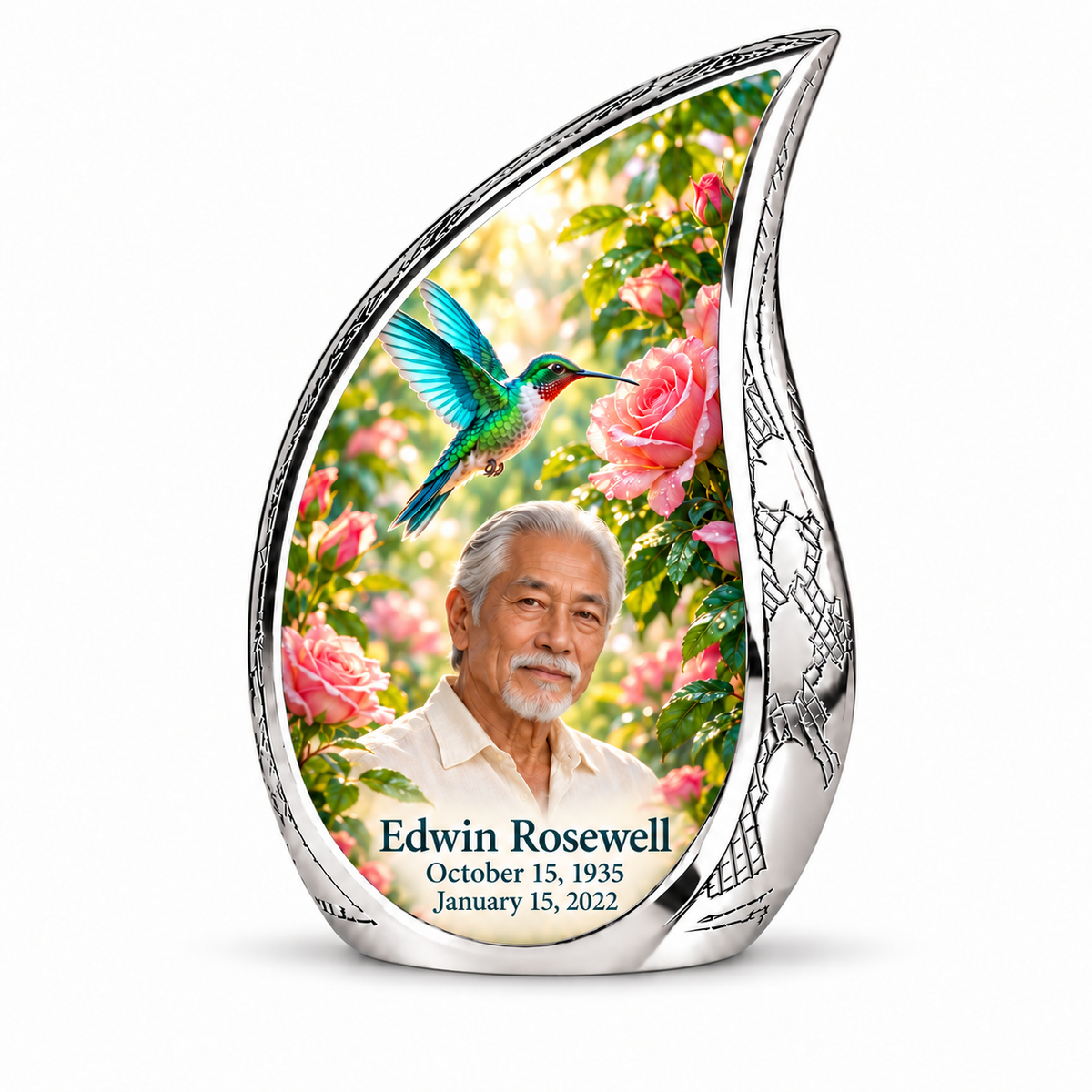 10 inch large Urn; Engraved silver Curved Drop with vivid turquoise and icy cyan hummingbird wings above soft pink roses and green leaves. Edwin Rosewell has a narrow angular East Asian face, swept-back silver hair, small white beard and cream shirt. Dark teal name and October 15, 1935 / January 15, 2022 dates are accurate.