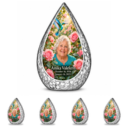 10 inch large Urn with 4 Keepsake 3 Inch Urns Straight Drop memorial urn, turquoise hummingbird among soft pink roses, Anika Valefern portrait and full memorial dates, white background.