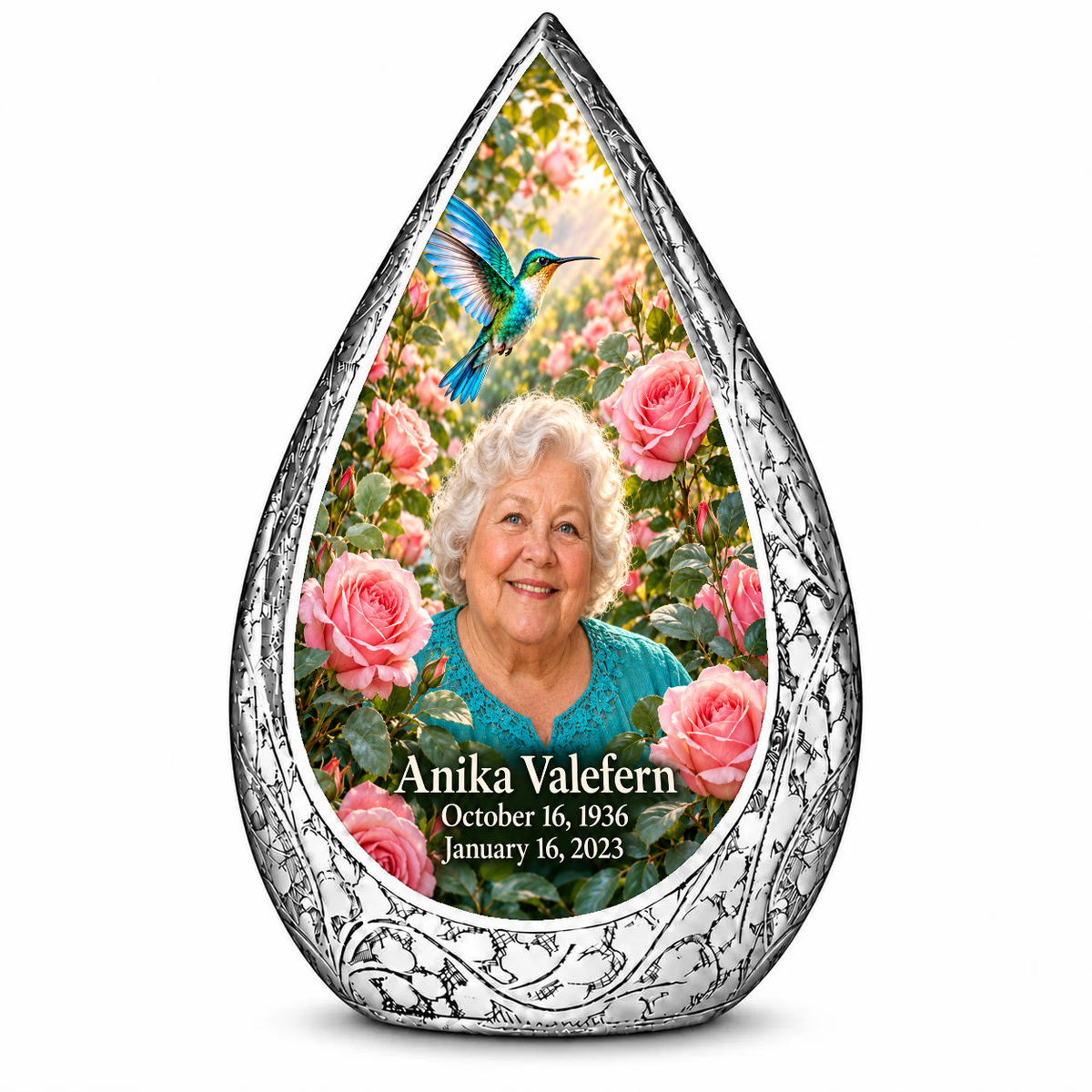 10 inch large Urn Straight Drop memorial urn, turquoise hummingbird among soft pink roses, Anika Valefern portrait and full memorial dates, white background.
