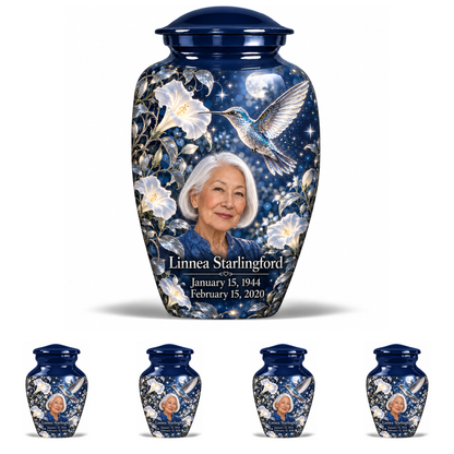 10 inch large Urn with 4 Keepsake 3 Inch Urns, Classic memorial urn with silver-blue hummingbird and starlit moonflowers, Linnea Starlingford portrait, January 15, 1944 to February 15, 2020.