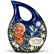 1 Keepsake 3 inch Urn; Navy Cross Drop with silver hummingbird, moonlit white flowers and Leona Willowfen portrait; miniature has open loop without cross.